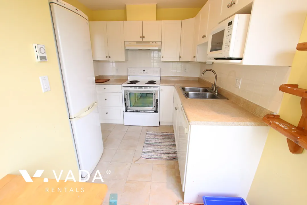 Woodford Place in South Cambie - Furnished 2 Bedroom Apartment For Rent in Vancouver at 303 - 876 West 16th Avenue, Vancouver, BC