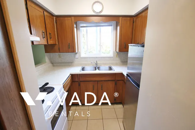 Osler Heights in Marpole - 1 Bedroom Apartment For Rent in Vancouver at 203 - 1065 West 72nd Avenue, Vancouver, BC