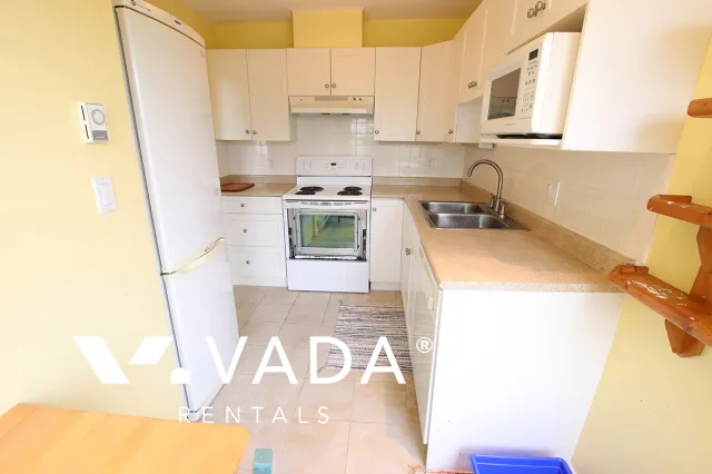 Woodford Place in South Cambie - Furnished 2 Bedroom Apartment For Rent in Vancouver at 303 - 876 West 16th Avenue, Vancouver, BC